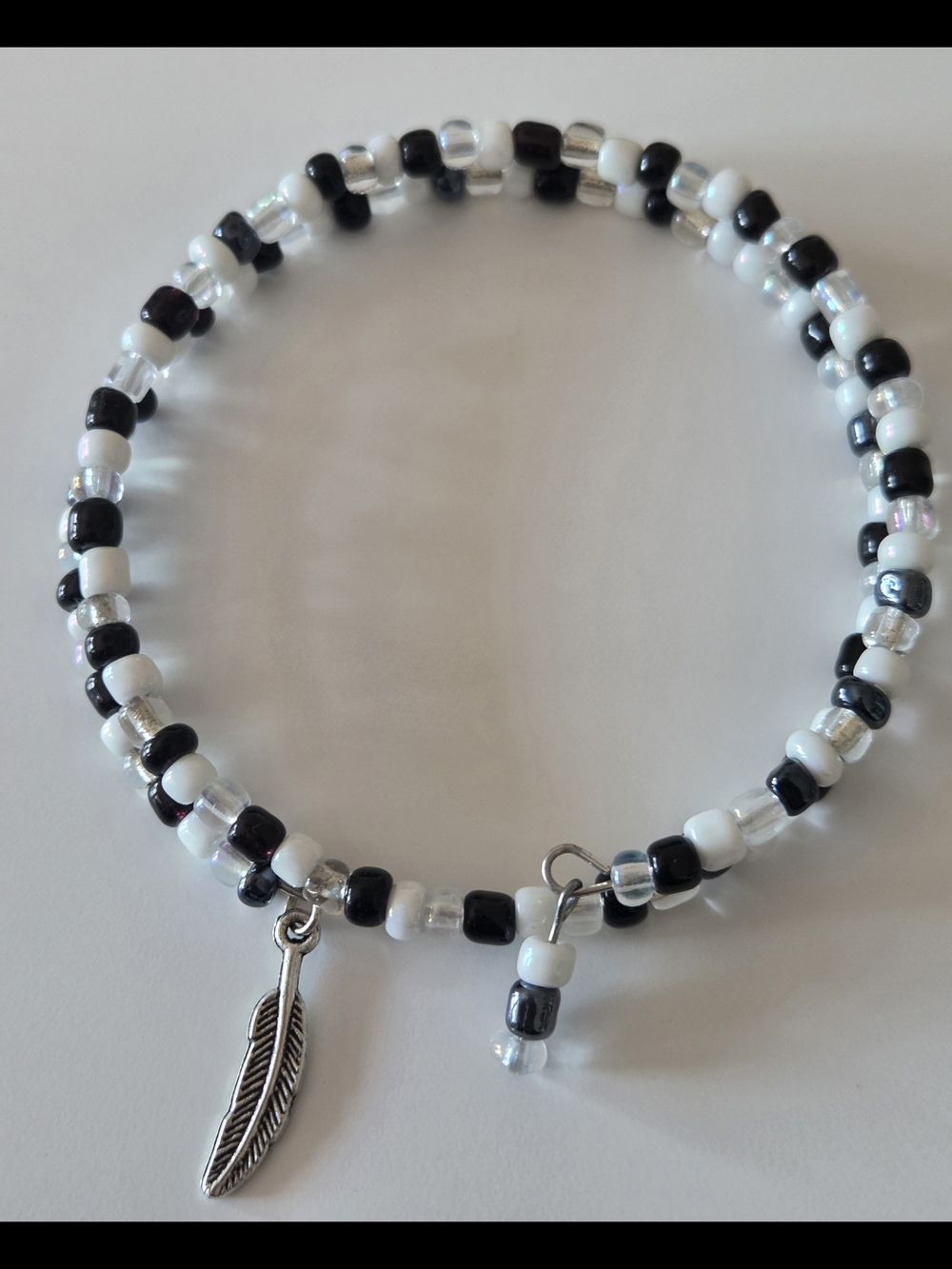 Handmade 7 1/2 Inch Black & White Beaded Wrap Bracelet with Feather Charm